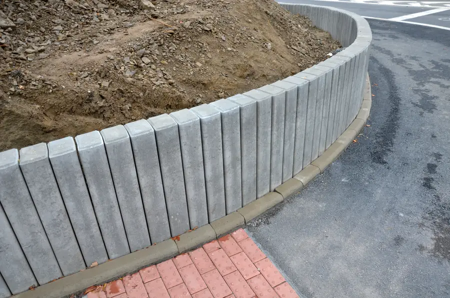 How Concrete Retaining Walls Improve Yard Stability in Rogers, AR